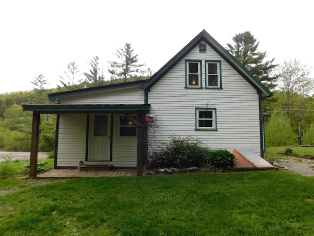 346 Bear River Rd, Newry, ME 04261 - rear view of property with a yard