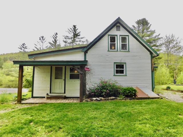 346 Bear River Rd, Newry, ME 04261 - rear view of property with a lawn