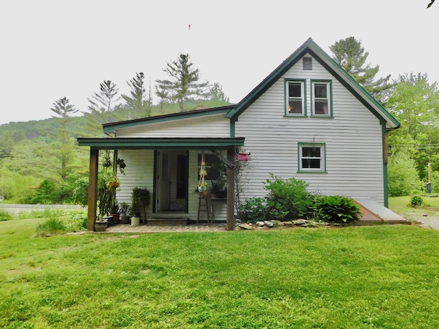 346 Bear River Rd, Newry, ME 04261 - rear view of house featuring a yard and a porch