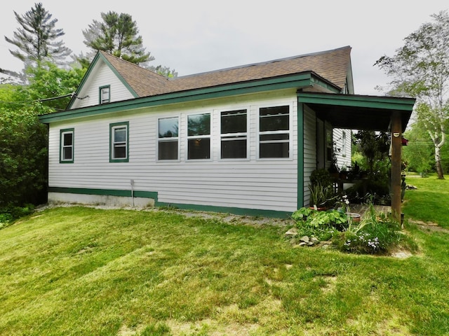 346 Bear River Rd, Newry, ME 04261 - view of property exterior featuring a lawn and a shingled roof