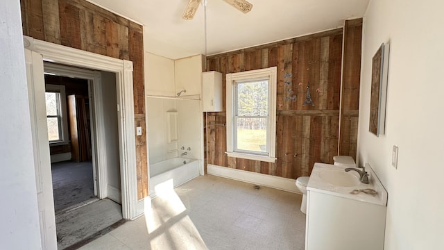 11 Maple St, Milo, ME 04463 - full bathroom featuring toilet, bathtub / shower combination, a ceiling fan, tile patterned floors, and vanity