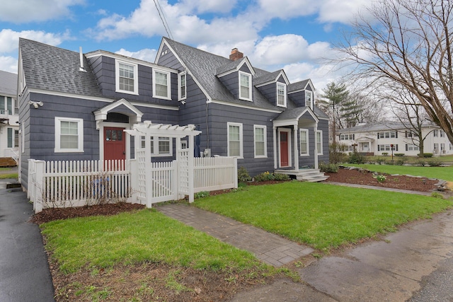 1 Silver Ter, Waterville, ME 04901 - view of front facade featuring a front yard, roof with shingles, a chimney, a gate, and a fenced front yard
