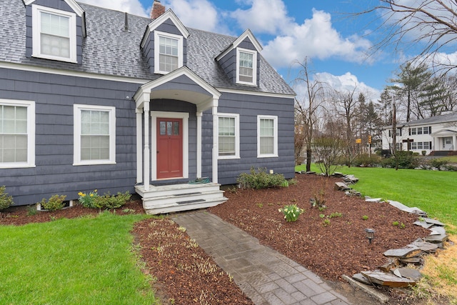 1 Silver Ter, Waterville, ME 04901 - cape cod house with a shingled roof, a chimney, and a front lawn