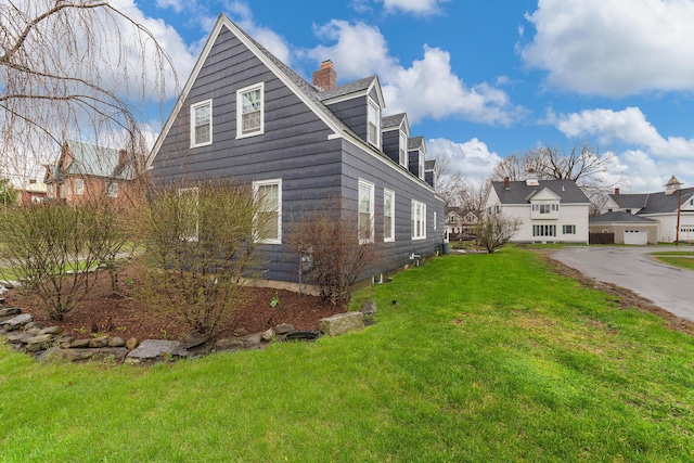 1 Silver Ter, Waterville, ME 04901 - view of side of home with a lawn and a chimney