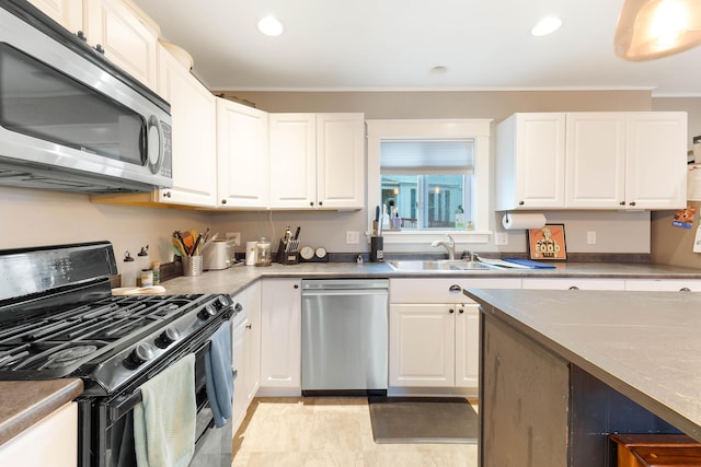1 Silver Ter, Waterville, ME 04901 - kitchen featuring a sink, appliances with stainless steel finishes, and white cabinetry