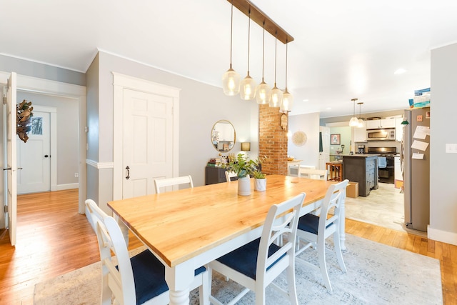 1 Silver Ter, Waterville, ME 04901 - dining space with ornamental molding and light wood-style floors