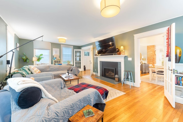 1 Silver Ter, Waterville, ME 04901 - living room featuring a fireplace and hardwood / wood-style floors