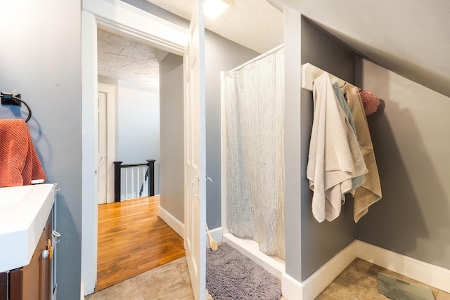 1 Silver Ter, Waterville, ME 04901 - bathroom featuring baseboards and curtained shower