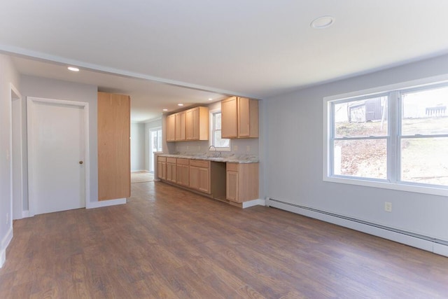 kitchen with a baseboard heating unit, dark wood finished floors, and recessed lighting