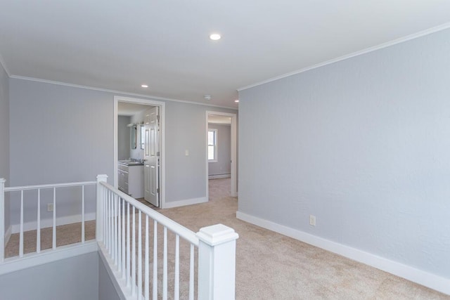 carpeted spare room with baseboards, recessed lighting, and crown molding
