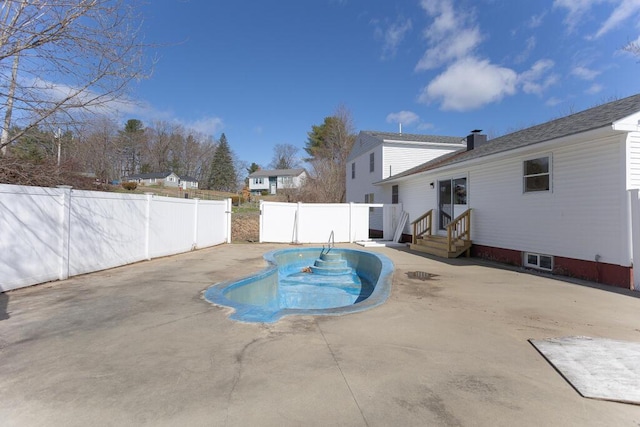 view of pool featuring fence, a patio, and a fenced in pool