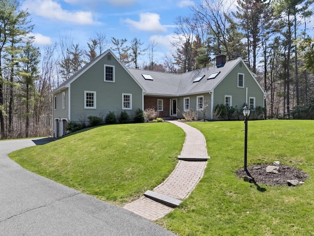 view of front of house featuring roof with shingles, a chimney, and a front lawn