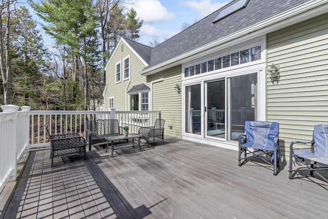deck featuring an outdoor hangout area