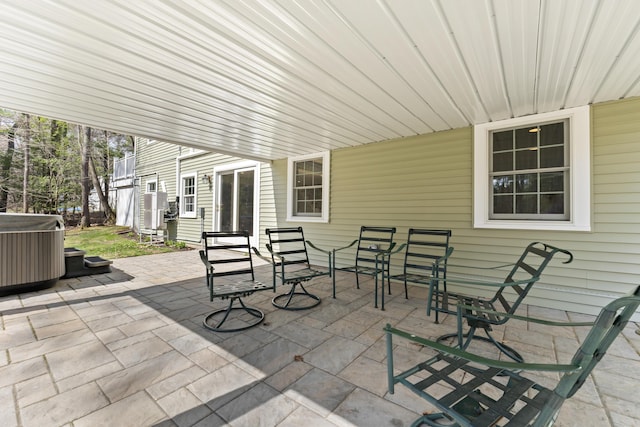 view of patio with a hot tub