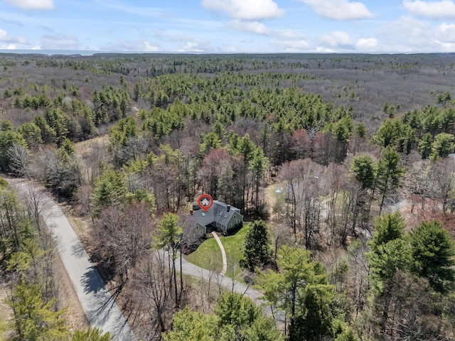 aerial view with a wooded view