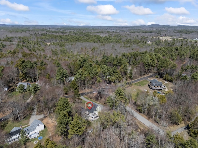 aerial view featuring a view of trees