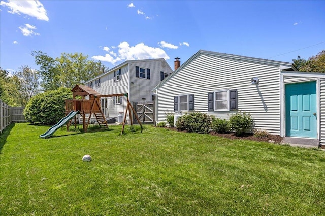 85 Tucker Ave, Portland, ME 04103 - rear view of house with a playground