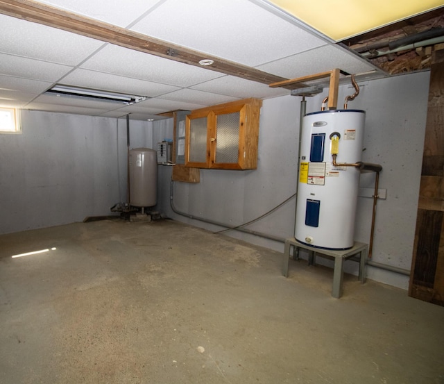 1114 Kennebec Rd, Hampden, ME 04444 - below grade area with water heater and a paneled ceiling
