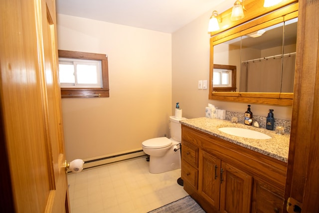 1114 Kennebec Rd, Hampden, ME 04444 - bathroom featuring tile patterned floors, baseboard heating, vanity, and toilet