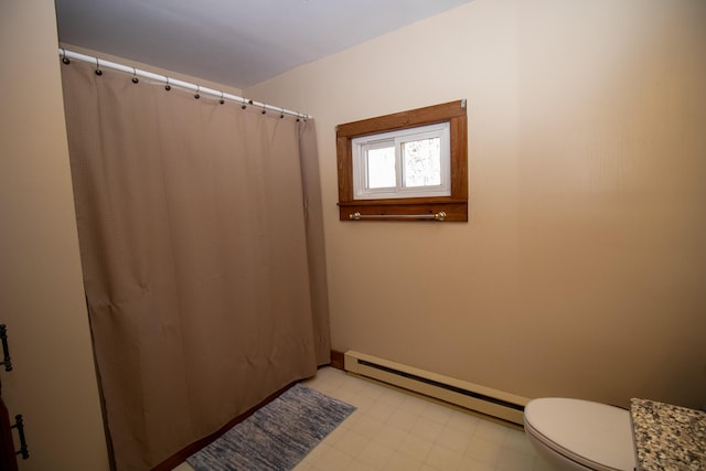 1114 Kennebec Rd, Hampden, ME 04444 - full bath featuring tile patterned floors, toilet, baseboards, baseboard heating, and a shower with shower curtain