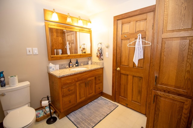1114 Kennebec Rd, Hampden, ME 04444 - bathroom featuring toilet, vanity, and tile patterned floors