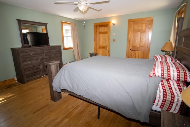 1114 Kennebec Rd, Hampden, ME 04444 - bedroom with a ceiling fan and wood finished floors