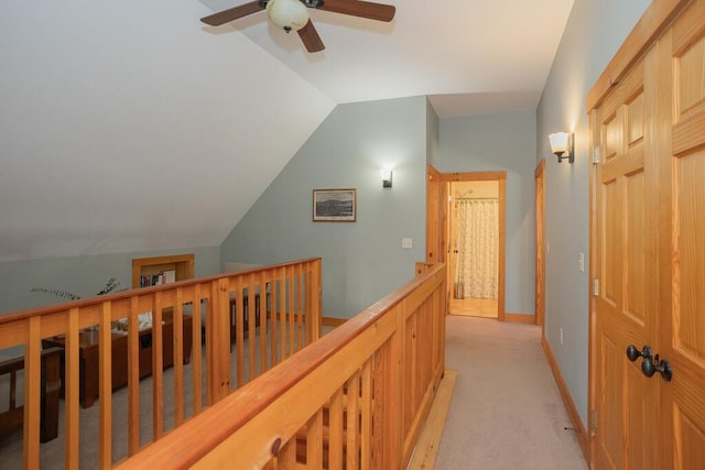 8 Sunset Ln, Kingfield, ME 04947 - corridor with vaulted ceiling, an upstairs landing, and light colored carpet