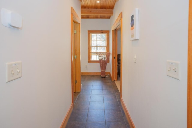 8 Sunset Ln, Kingfield, ME 04947 - hall with wooden ceiling, baseboards, beam ceiling, and dark tile patterned flooring