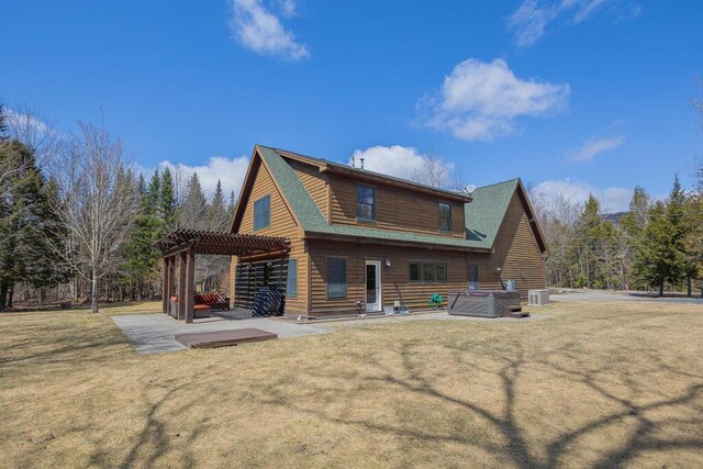 8 Sunset Ln, Kingfield, ME 04947 - back of house featuring a lawn, a pergola, a patio area, and a shingled roof