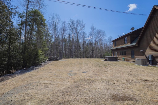 8 Sunset Ln, Kingfield, ME 04947 - view of yard featuring a wooded view and central AC unit