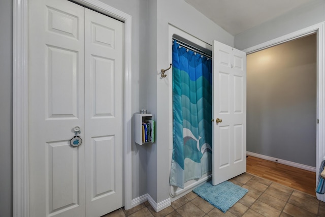 390 Castine Rd, Castine, ME 04421 - full bath with baseboards and curtained shower