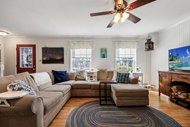 390 Castine Rd, Castine, ME 04421 - living area with crown molding, ceiling fan, light wood-style flooring, and baseboard heating