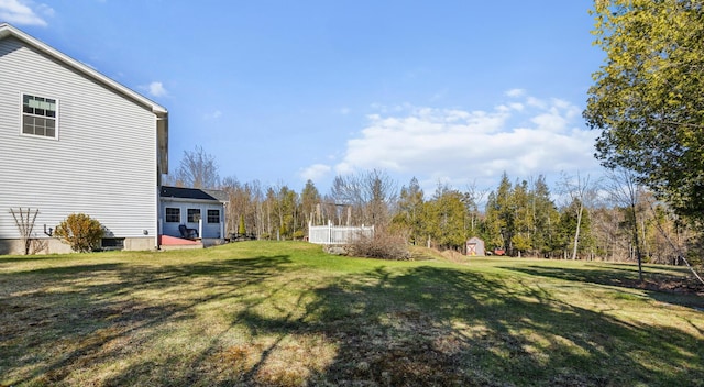 390 Castine Rd, Castine, ME 04421 - view of grassy yard featuring a storage unit and an outdoor structure