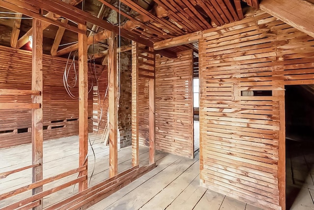 miscellaneous room with wood-type flooring