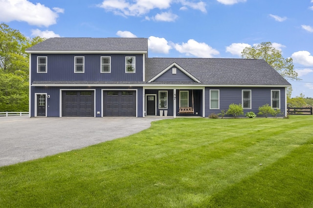 17 Wadlin Rd, Biddeford, ME 04005 - view of front of property featuring driveway, a shingled roof, a porch, and a garage
