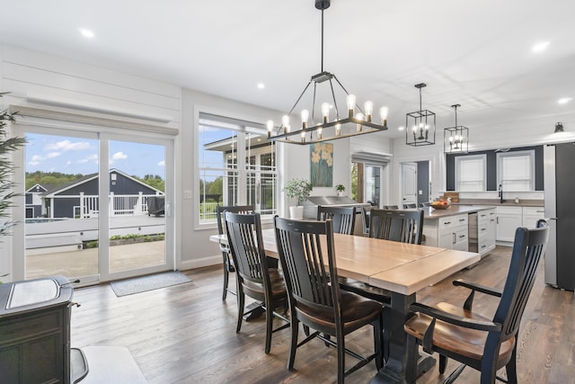 17 Wadlin Rd, Biddeford, ME 04005 - dining space with a chandelier, wood finished floors, and recessed lighting