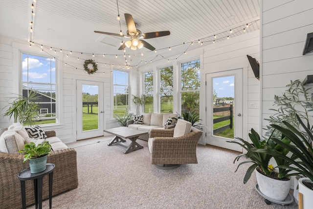 17 Wadlin Rd, Biddeford, ME 04005 - sunroom with carpet floors, wooden walls, and track lighting