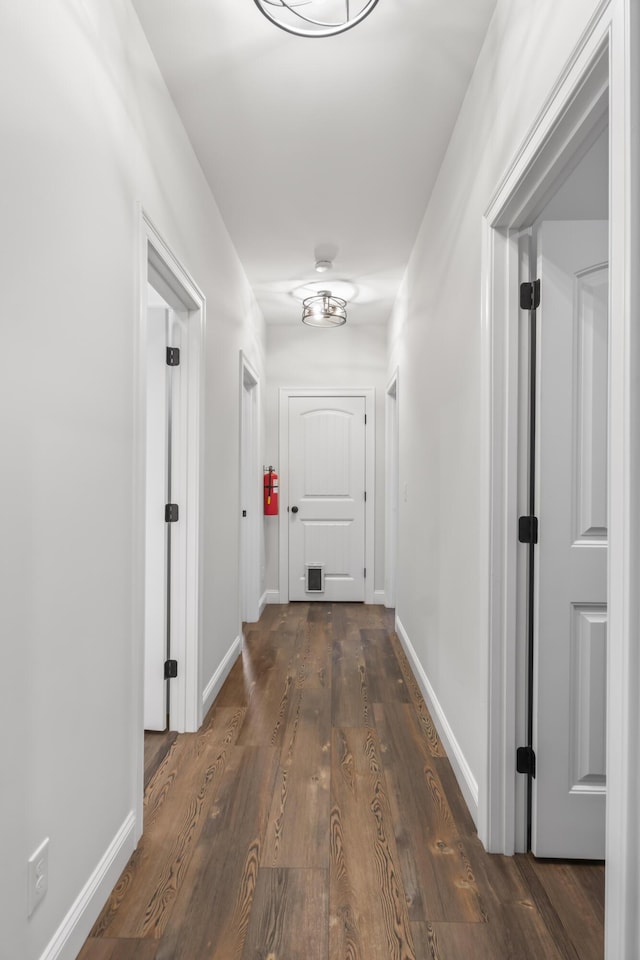 17 Wadlin Rd, Biddeford, ME 04005 - hallway with dark wood-type flooring and baseboards