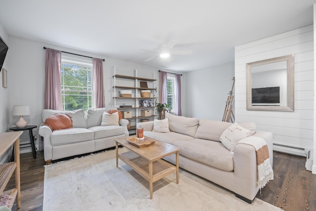 17 Wadlin Rd, Biddeford, ME 04005 - living room featuring baseboard heating, wood finished floors, and a ceiling fan