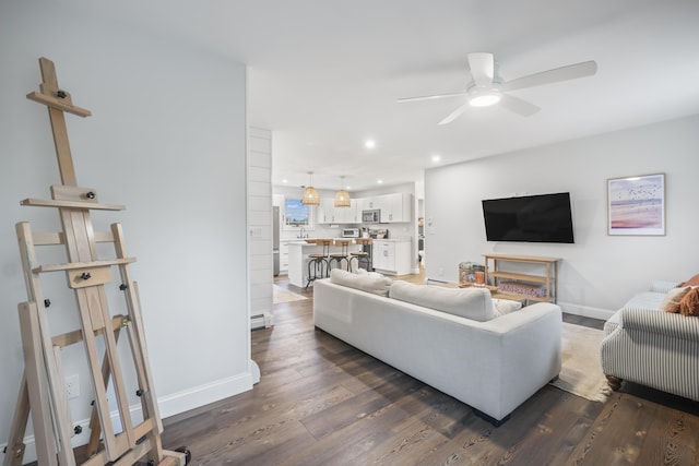 17 Wadlin Rd, Biddeford, ME 04005 - living room featuring ceiling fan, dark wood finished floors, baseboards, recessed lighting, and baseboard heating