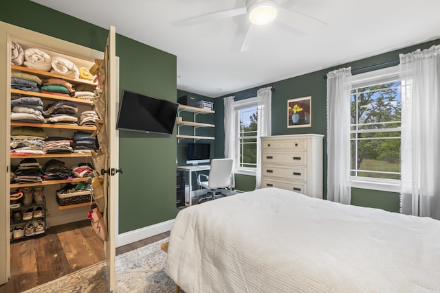 17 Wadlin Rd, Biddeford, ME 04005 - bedroom with wood finished floors, a spacious closet, an office area, a closet, and a ceiling fan