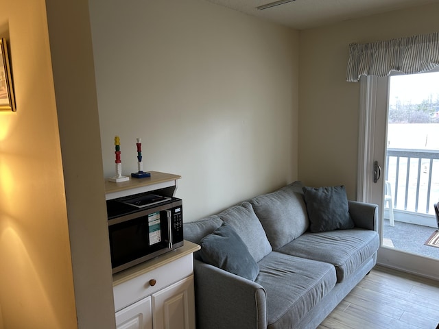 living area with light wood-type flooring