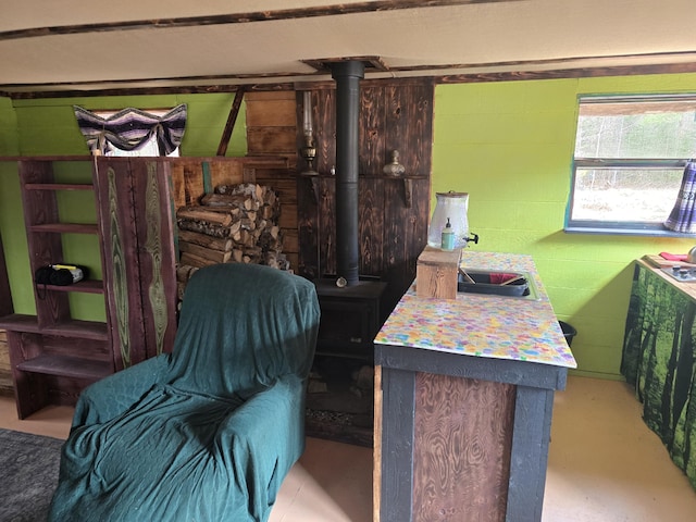 interior space featuring concrete block wall