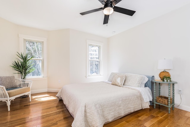 11 Rogers Rd, Kittery, ME 03904 - bedroom featuring wood finished floors, baseboards, and ceiling fan