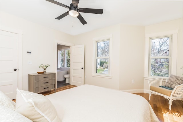 11 Rogers Rd, Kittery, ME 03904 - bedroom featuring wood finished floors, a ceiling fan, baseboards, and ensuite bathroom