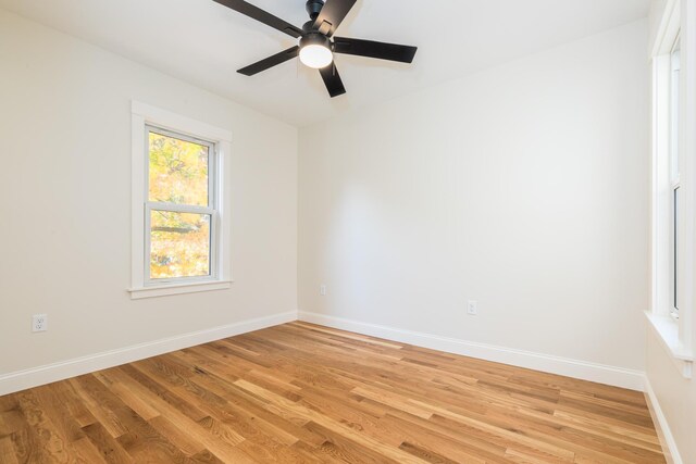 11 Rogers Rd, Kittery, ME 03904 - spare room featuring light wood-style flooring, a ceiling fan, and baseboards