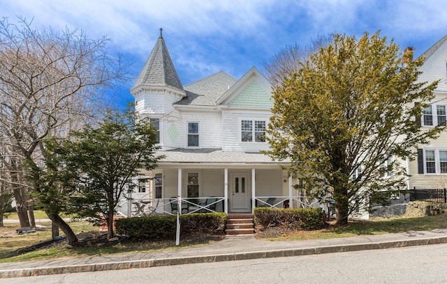 11 Rogers Rd, Kittery, ME 03904 - victorian home with a porch and roof with shingles