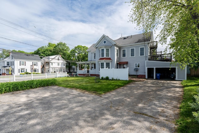 546 Main St, Westbrook, ME 04092 - victorian home with asphalt driveway and roof with shingles