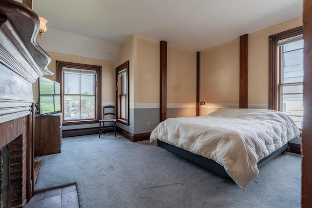 546 Main St, Westbrook, ME 04092 - carpeted bedroom with a brick fireplace and baseboards