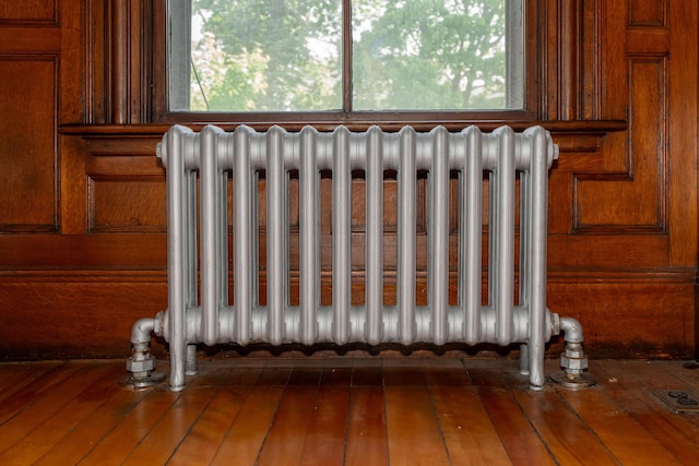 546 Main St, Westbrook, ME 04092 - detailed view of radiator and wooden walls